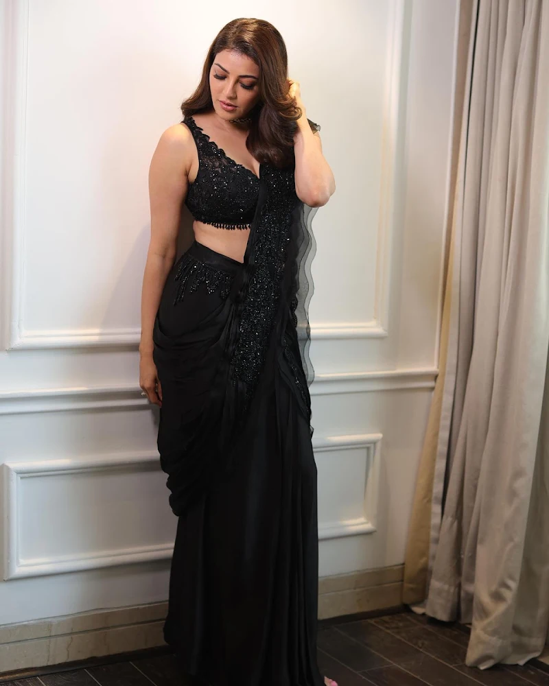 kajal aggarwal shimmery black saree curvy actress