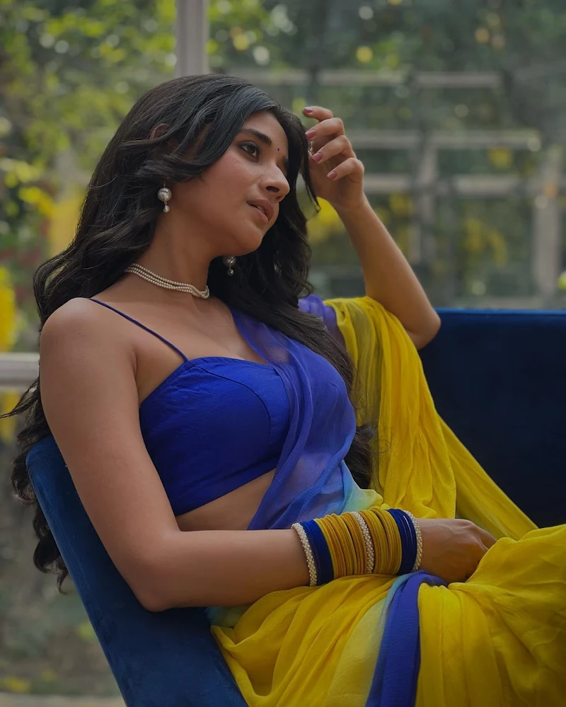 kanika mann blue yellow saree cleavage