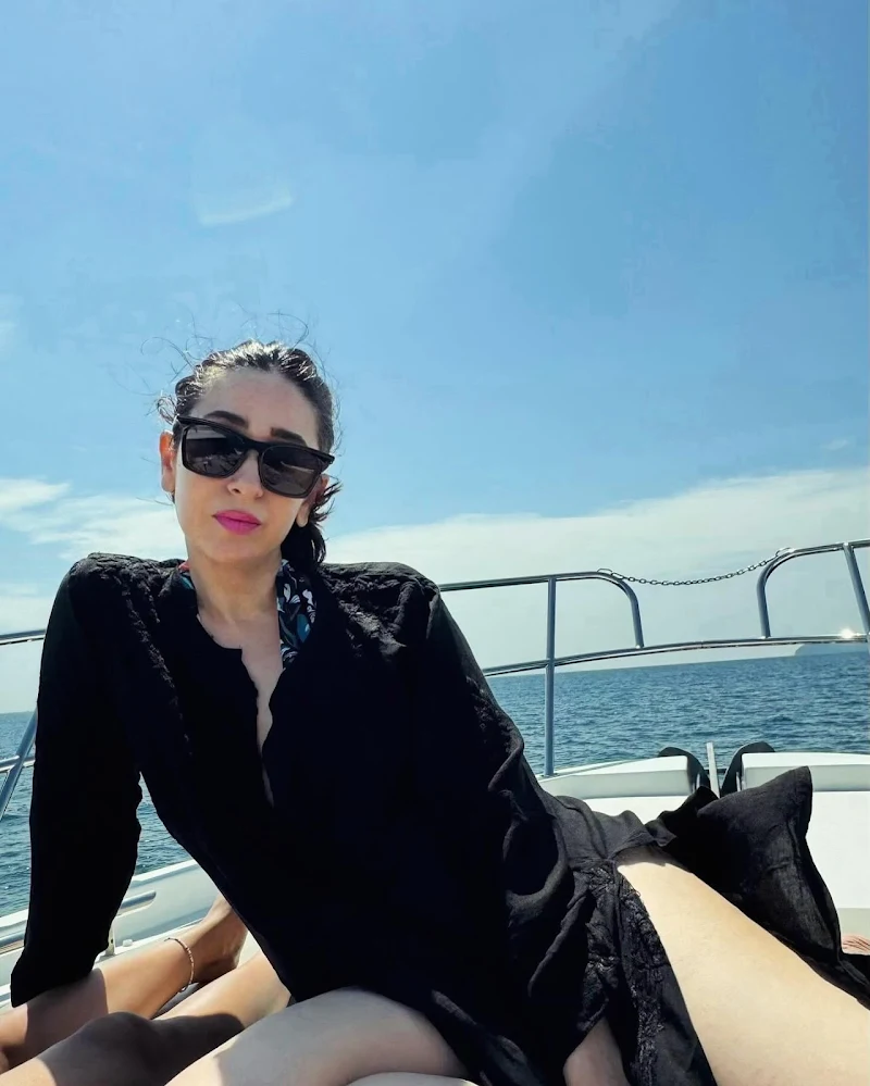 karishma kapoor black outfit vacation pics