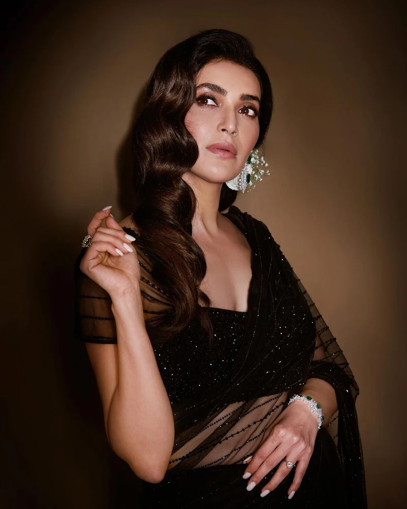 Karishma Tanna sheer black saree hot tv actress