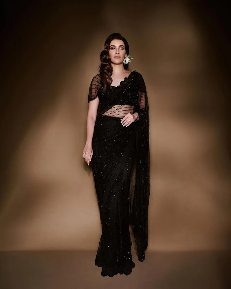 Karishma Tanna sheer black saree hot tv actress