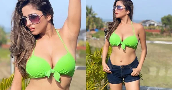 Kate Sharma in neon green bikini top with shorts flaunts her curvy sexy body – see now.