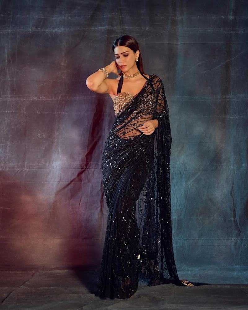 Kriti Sanon sheer black saree hot actress