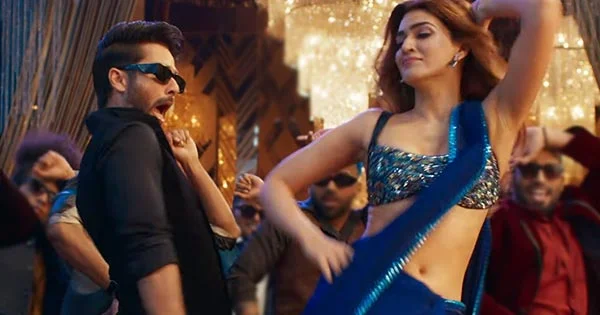 Kriti Sanon in new song, laal Peeli Akhiyaan, is too hot to handle – slayed in blue saree with tiny bralette.