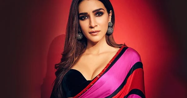 Kriti Sanon is stunning hot in this pink-red striped saree with cleavage baring black blouse – see pics.