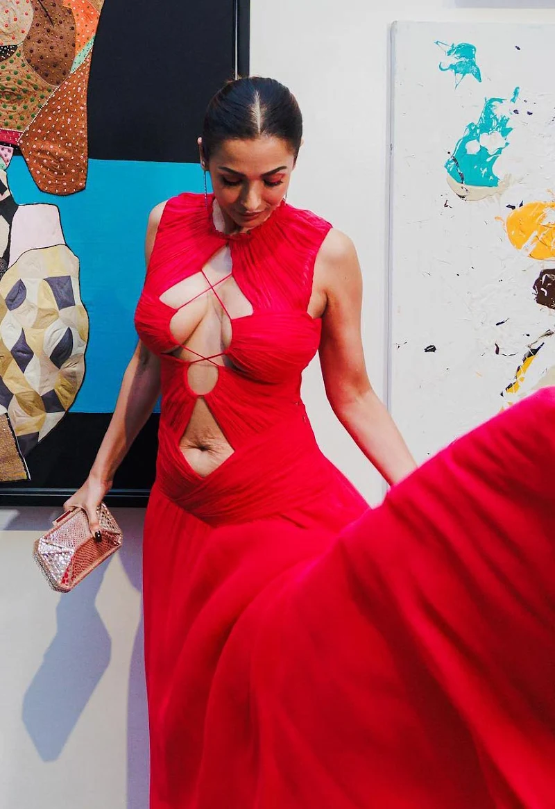 Malaika Arora red dress cleavage navel