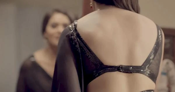 Megha Gupta flaunting her sexy back in sheer black saree – hot video.