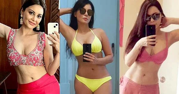 11 sizzling hot selfies of Minissha Lamba in bikinis, dresses and sarees.