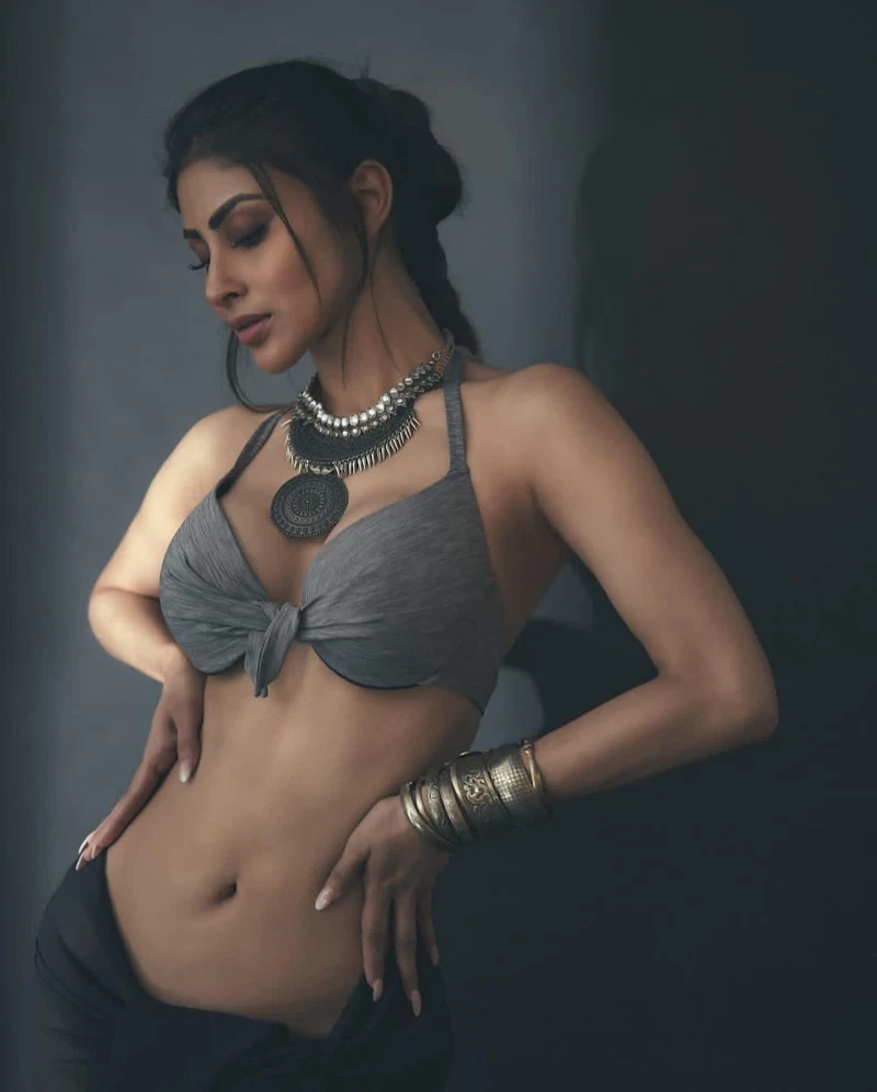 mouni roy navel cleavage bikini top hot photoshoot