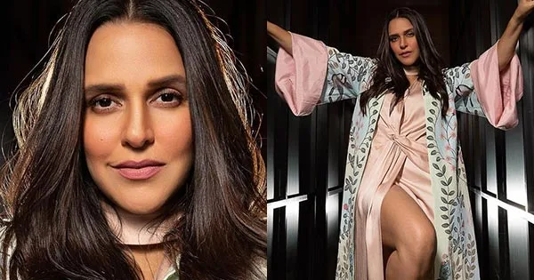 Neha Dhupia sexy legs high slit dress