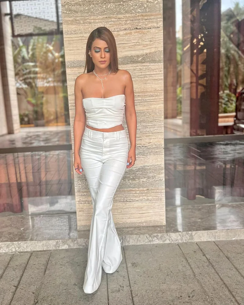 Nia Sharma cleavage white top