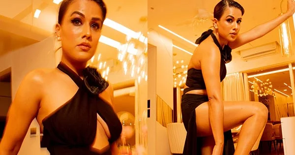 nia sharma high slit black dress sexy legs