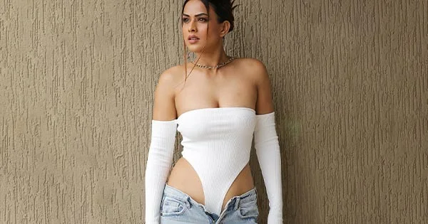 Nia Sharma in unbuttoned jeans and off shoulder white bodysuit sets social media on fire – see photos.