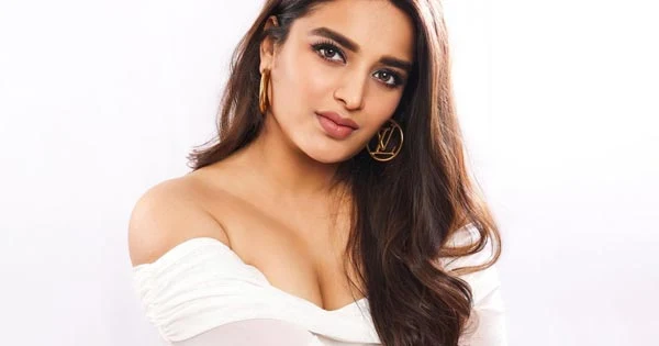 Nidhhi Agerwal in white bodycon dress flaunted her fine curvy figure – see photos.