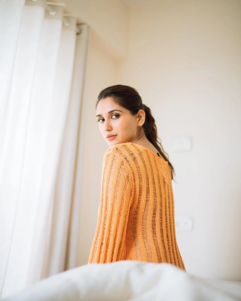 nikita dutta sexy legs orange sheer outfit