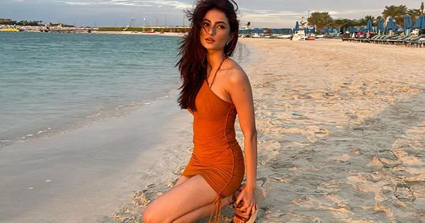 Palak Tiwari enjoys beach time in a short dress hugging her slim toned figure – see photos.