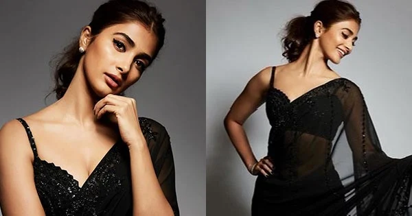 Pooja Hegde looks stunning hot in a sheer black shimmery saree.