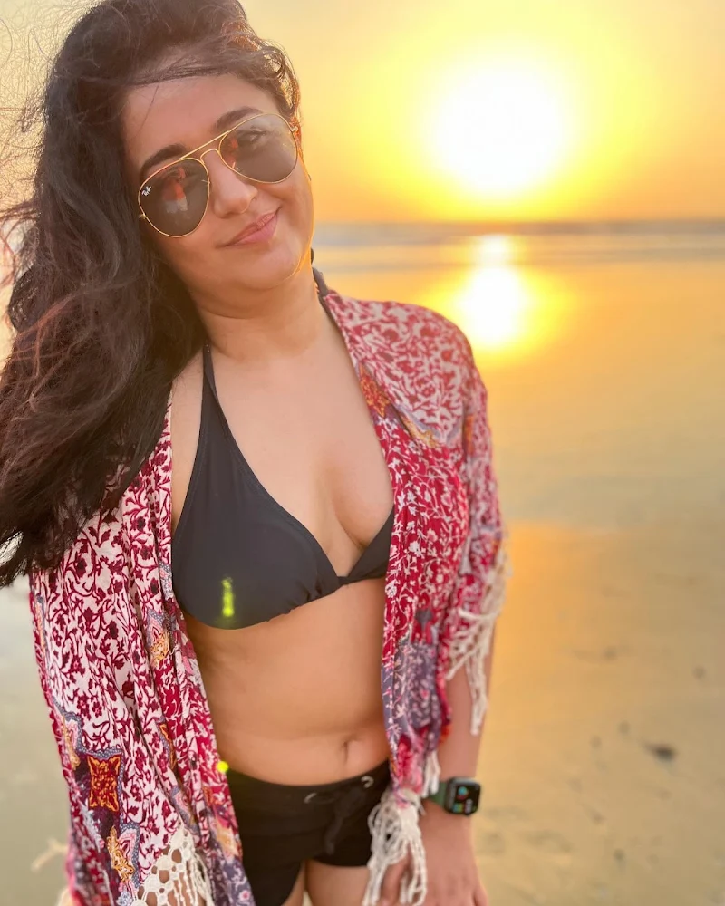 poonam bajwa black bikini cleavage curvy body