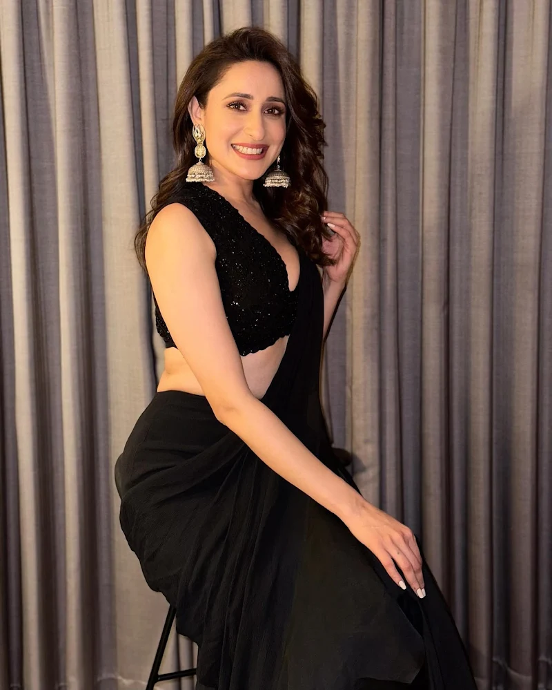 pragya jaiswal black saree deep neckline blouse