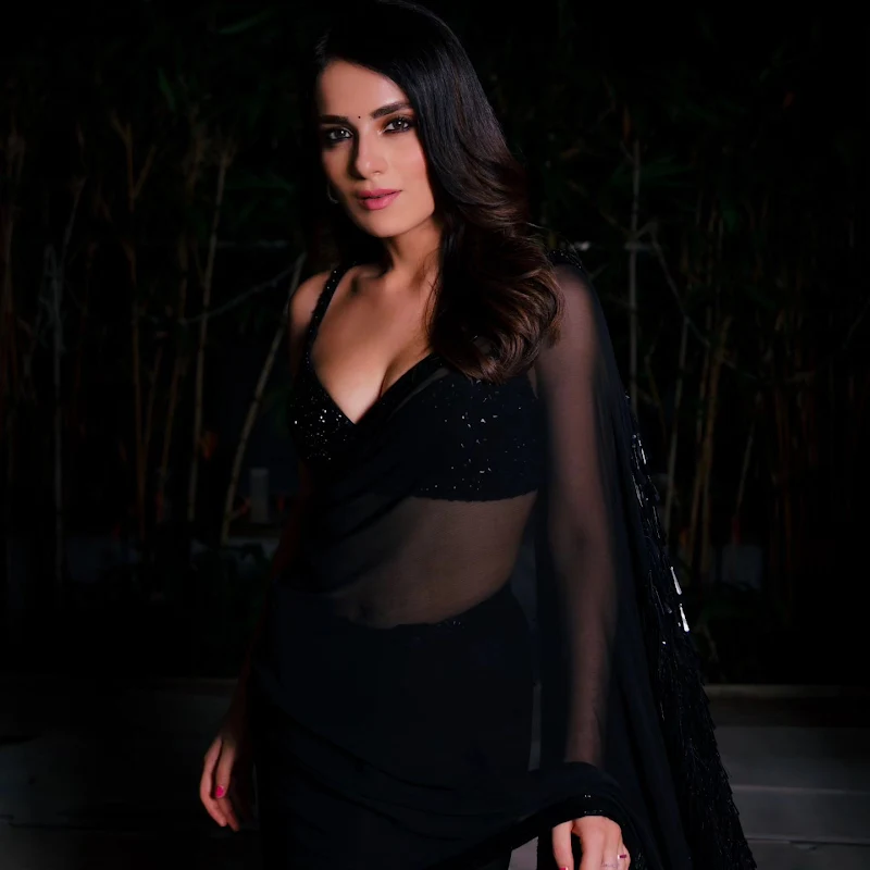 radhika madan sheer black saree cleavage