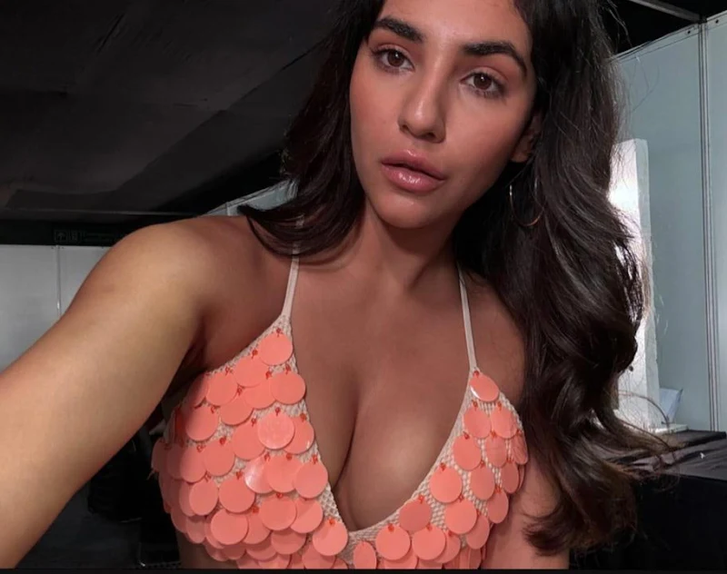 radhika seth cleavage tiny top