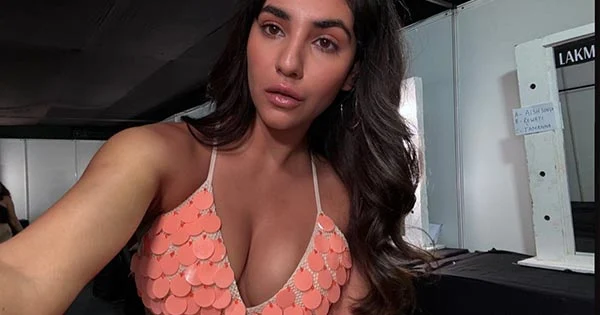 Radhika Seth put a busty display in this skimpy top for a fashion show – see pics and video.