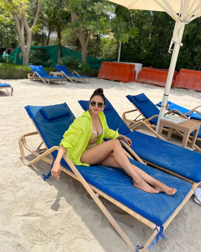 Rakul Preet green bikini cleavage sexy legs