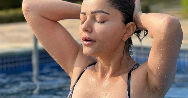 Rubina Dilaik’s sensuous wet avatar in a swimsuit raises the heat – see photos.