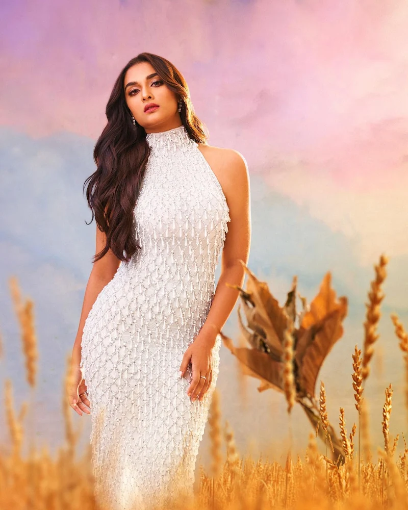 Saiee Manjrekar backless white dress curvy body