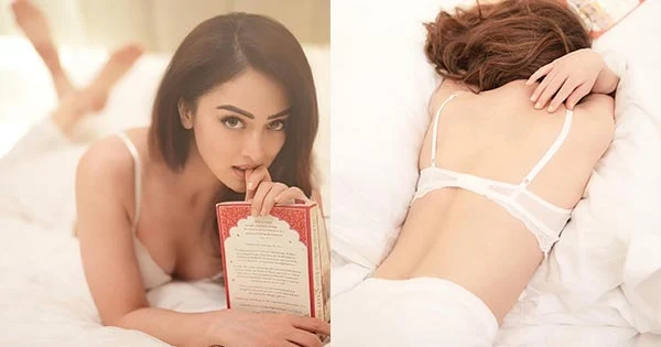 Sandeepa Dhar in white bra poses while enjoying a book in bed.