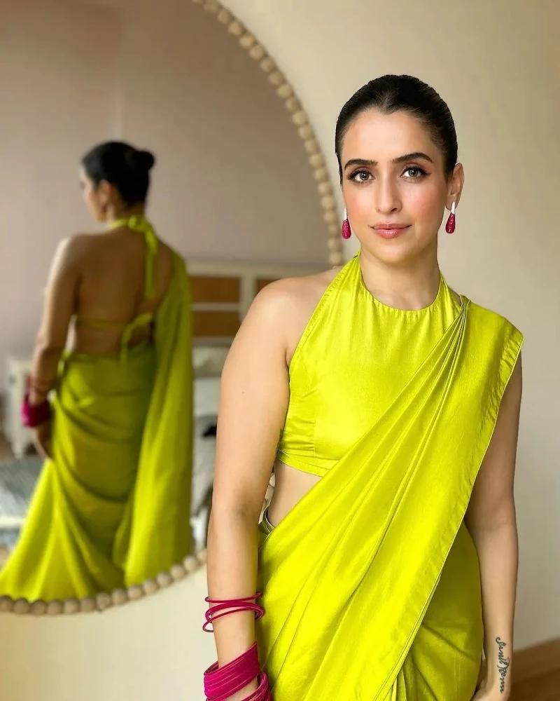 Sanya Malhotra green saree sleeveless backless blouse