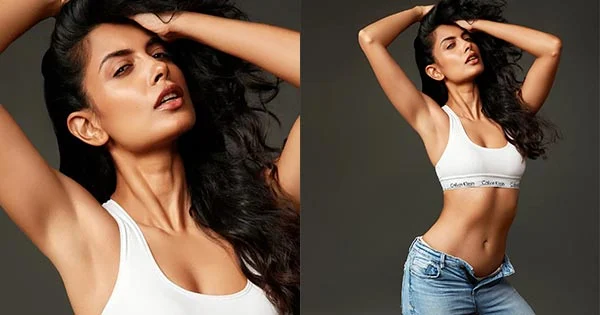 Tandav actress, Sarah Jane Dias, in sports bra and unbuttoned jeans flaunts her sexy body.