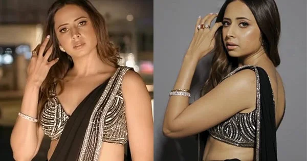 Sargun Mehta raises heat with her sultry avatar in this black high slit saree – see now.