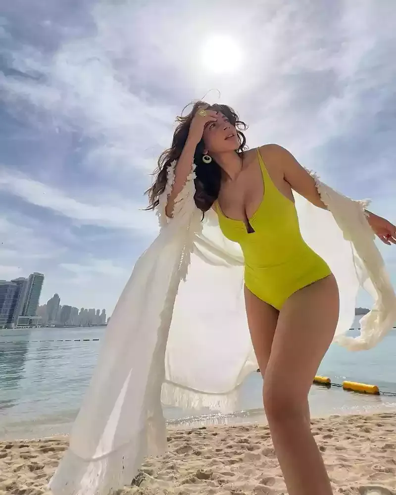 shama sikander swimsuit sexy body cleavgae