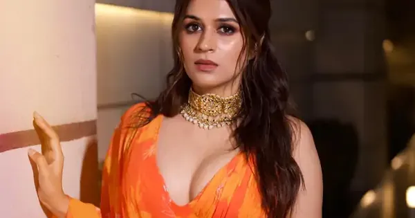 Shraddha Das in orange saree with cleavage baring blouse raised the heat in style.