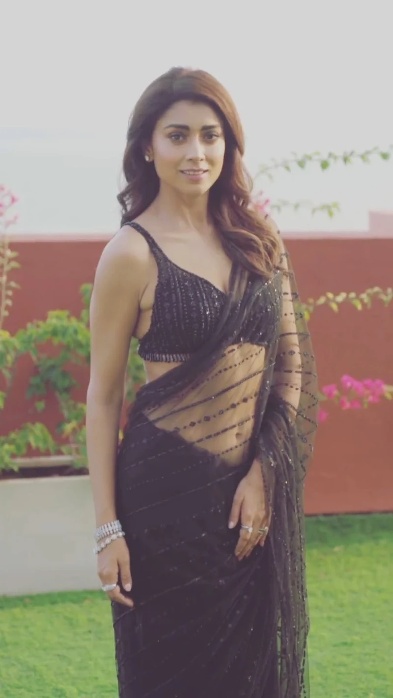 shriya saran sheer black saree navel