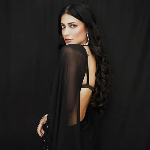 Shruti Haasan black sheer backless saree