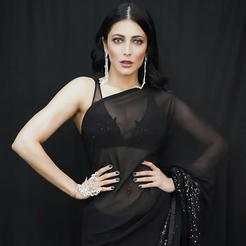 Shruti Haasan black sheer backless saree