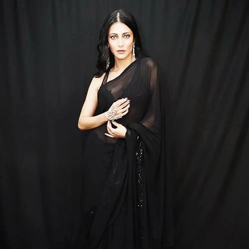 Shruti Haasan black sheer backless saree