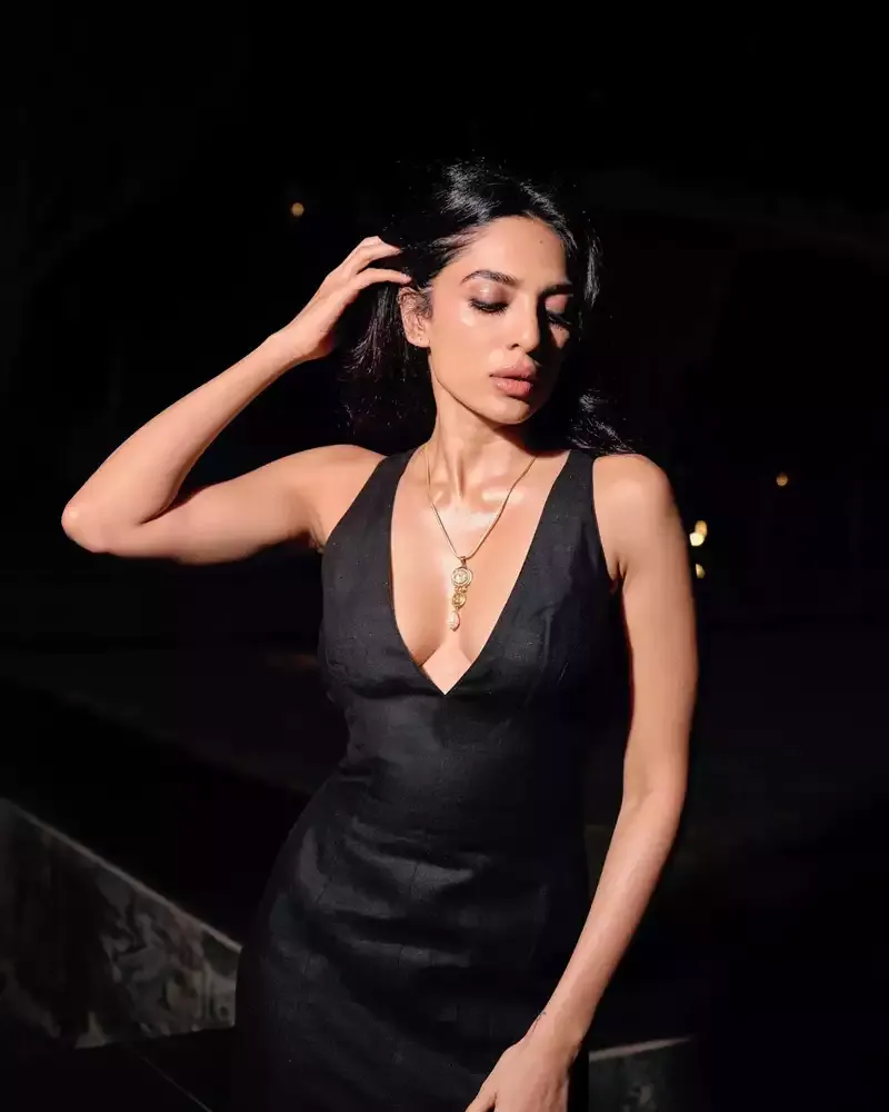 sobhita dhulipala cleavage black high slit dress