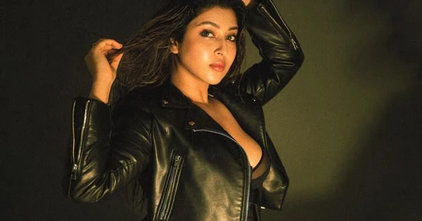 Sonarika Bhadoria flaunts her curvy figure in this short black dress with leather jacket – see now.