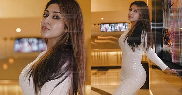 Sonarika Bhadoria flaunts her fine curvy body in this shimmery body hugging white dress – see photos.