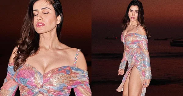 Sonnalli Seygall in this cleavage baring stylish outfit flaunted her sexy legs on the beach – see now.