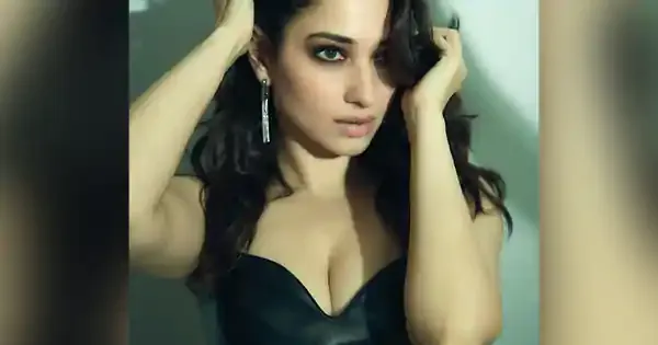 Tamannaah in cleavage baring black leather outfit sets temperature soaring.