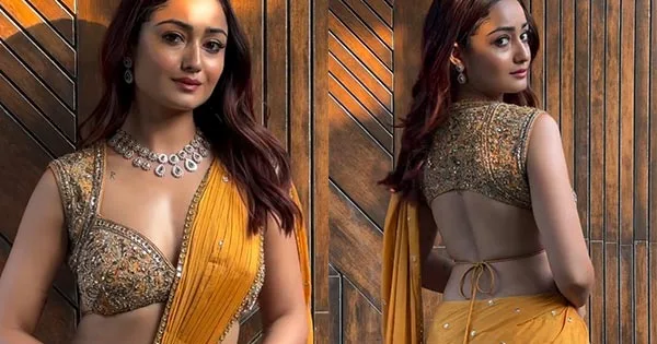 Tridha Choudhury raises the heat in this yellow saree with plunging neckline blouse – see now.