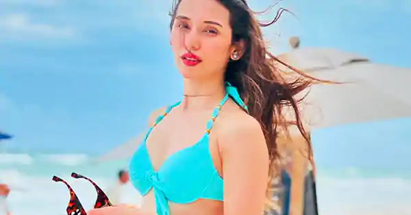 Heli Daruwala in turquoise bikini top sets temperature soaring.