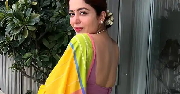 May I Come In Madam actress, Nehha Pendse, in yellow saree with backless blouse looked stunning.