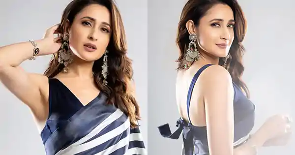 Pragya Jaiswal in tie-back backless blouse with simple saree looked heavenly.