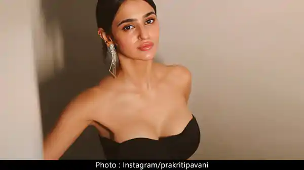 prakriti pavani off shoulder black dress cleavage busty indian