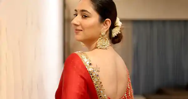 Disha Parmar in backless red saree is a sight to behold.